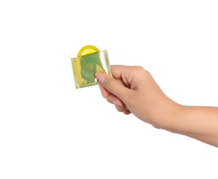 Photo of Woman holding condom on white background, closeup