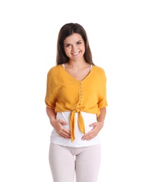 Happy pregnant woman posing on white background