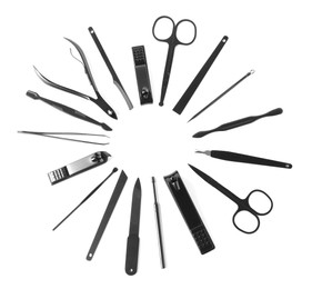 Manicure set on white background, top view