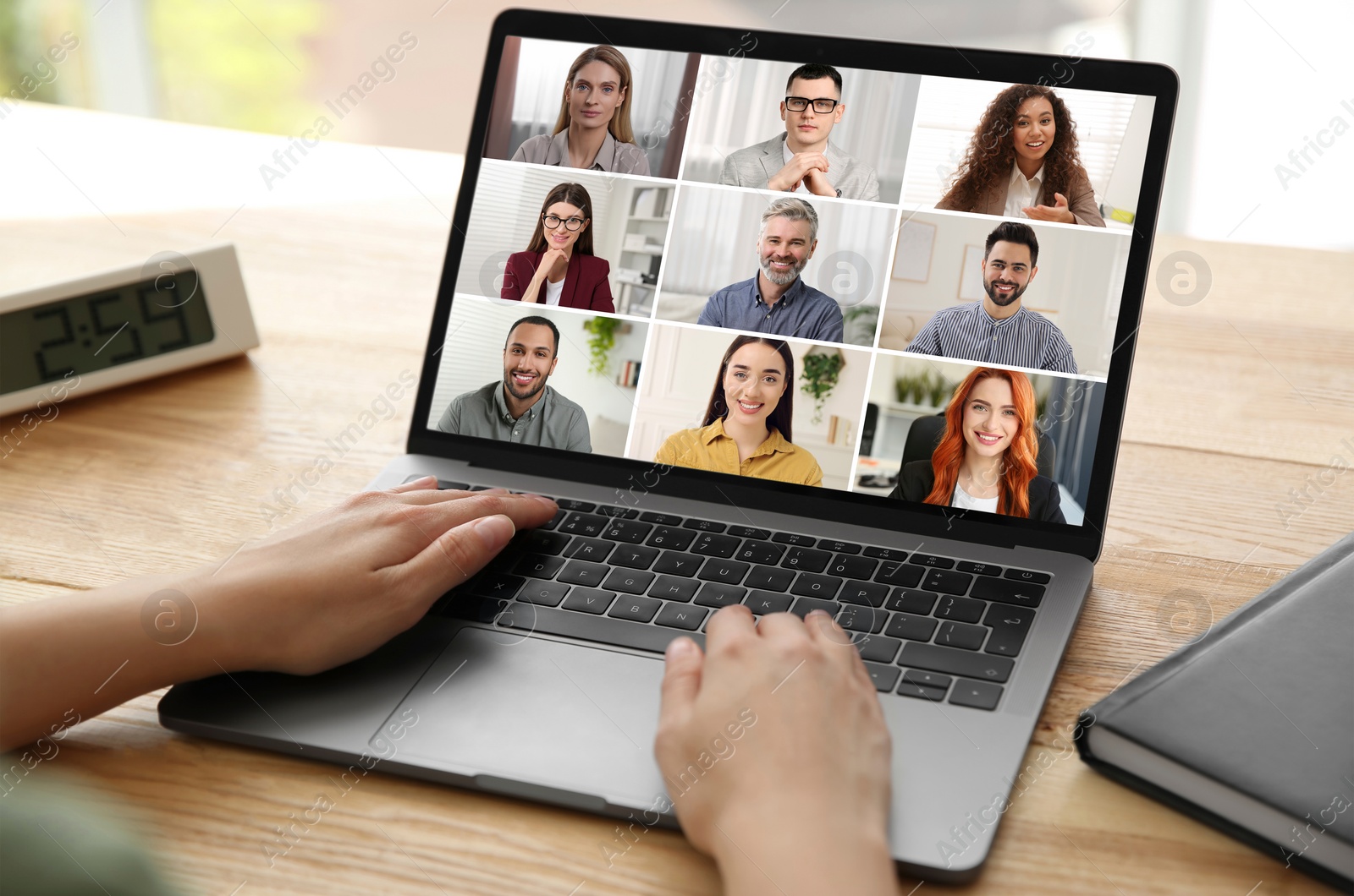 Image of Woman participating in webinar via laptop at table, closeup