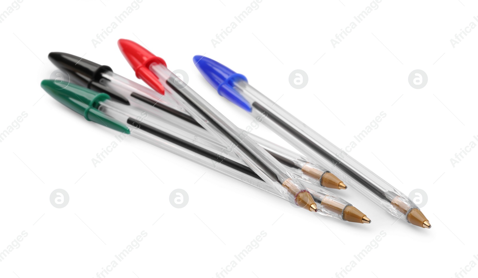 Photo of New color plastic pens isolated on white, closeup