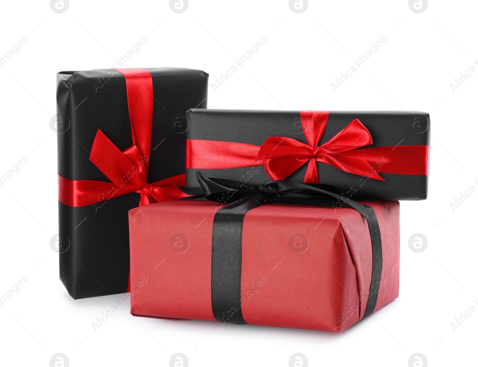 Photo of Gift boxes with bows isolated on white