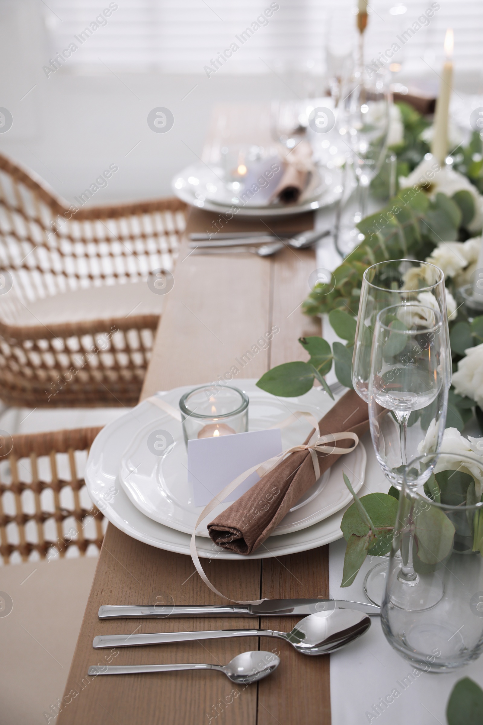 Photo of Festive table setting with beautiful tableware and decor indoors