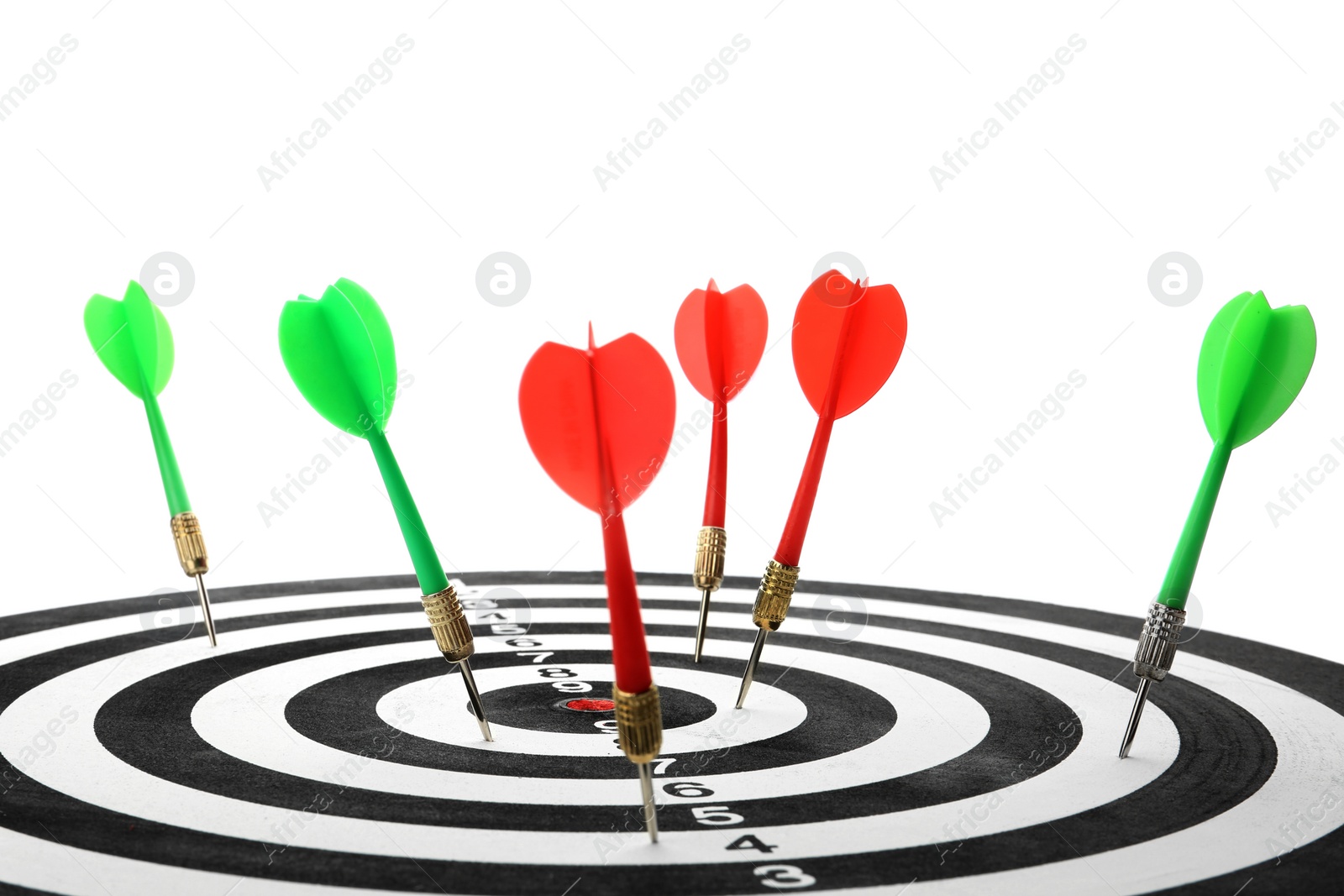 Photo of Arrows hitting target on dart board against white background