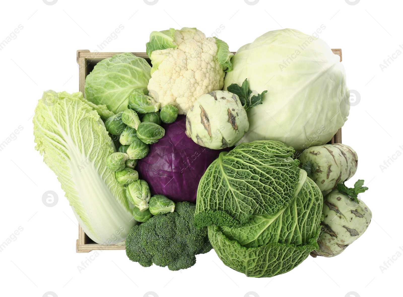 Photo of Wooden crate with different types of fresh cabbage on white background, top view