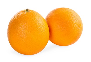 Photo of Two fresh ripe oranges isolated on white