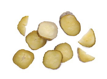 Photo of Slices of tasty pickled cucumber on white background, top view