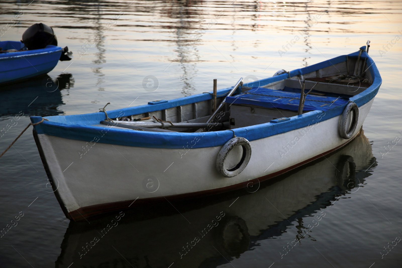 Photo of Beautiful view of river with moored boats at sunset