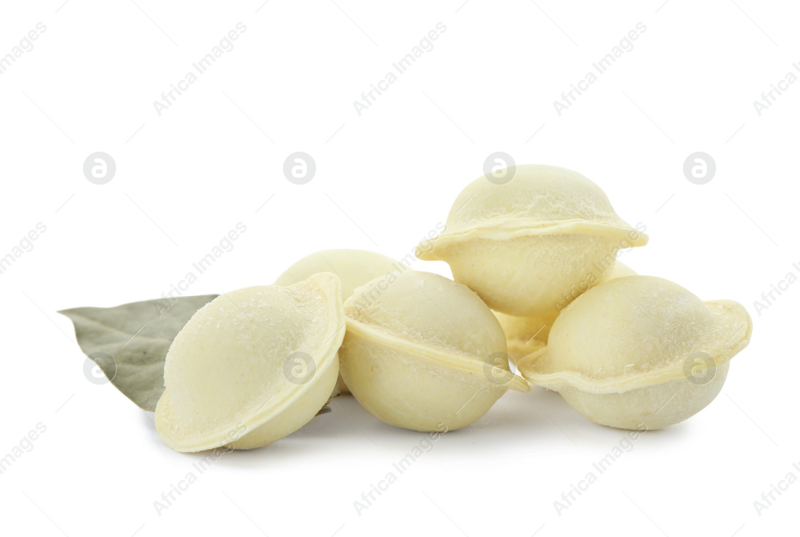 Photo of Raw meat dumplings with bay leaf on white background