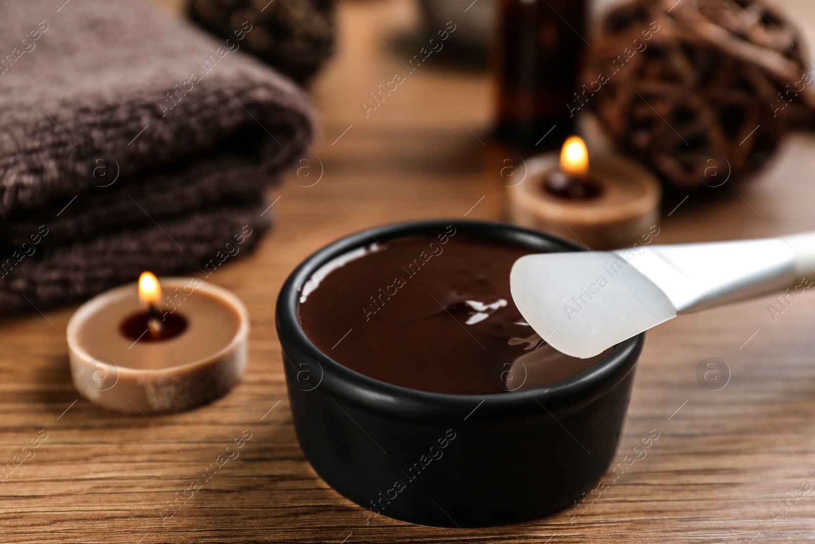 Photo of Composition with cosmetic product for spa body wraps on wooden background