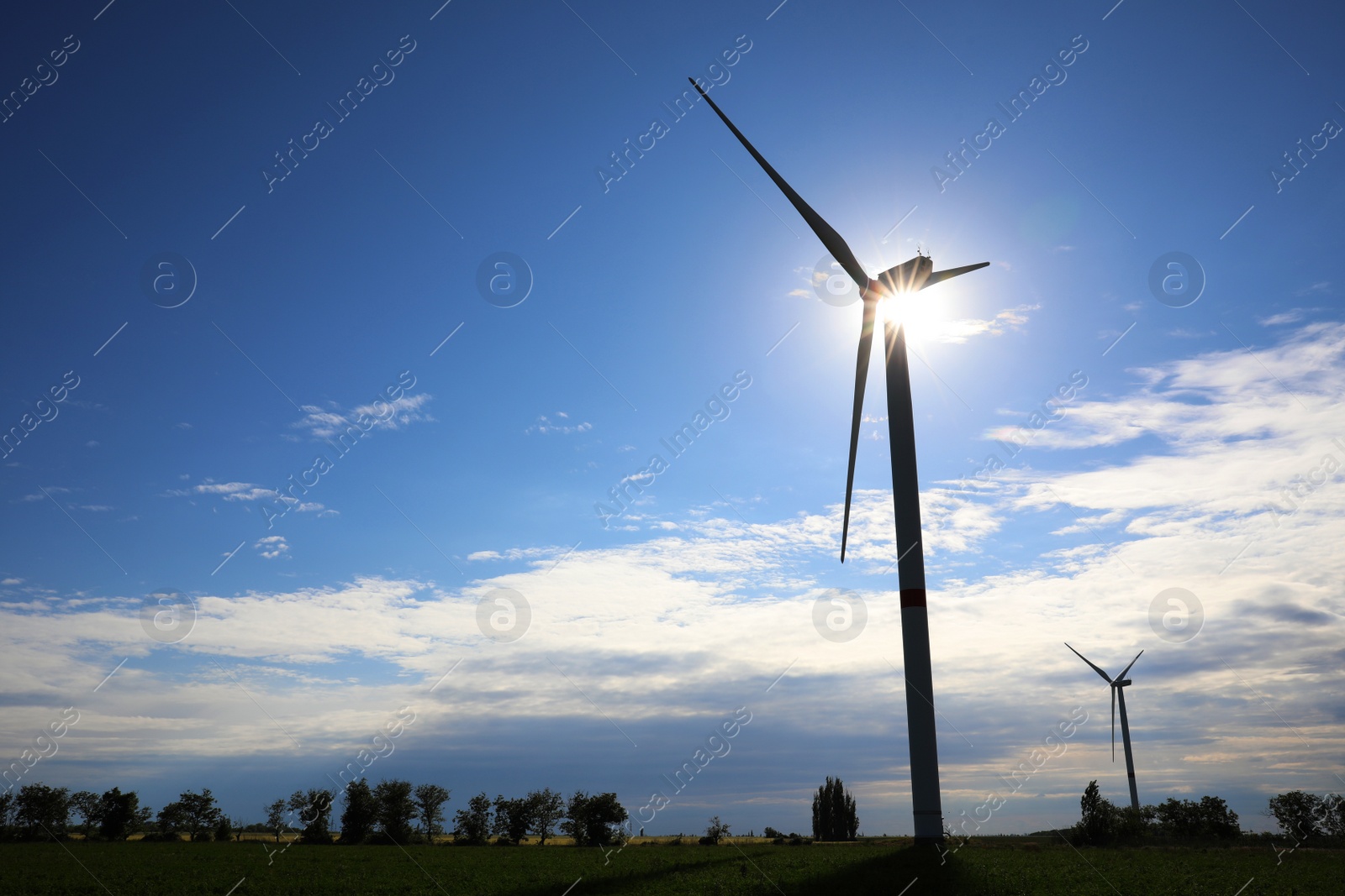 Photo of Beautiful view of landscape with wind turbines. Alternative energy source