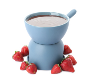 Photo of Fondue pot with chocolate and fresh strawberries isolated on white