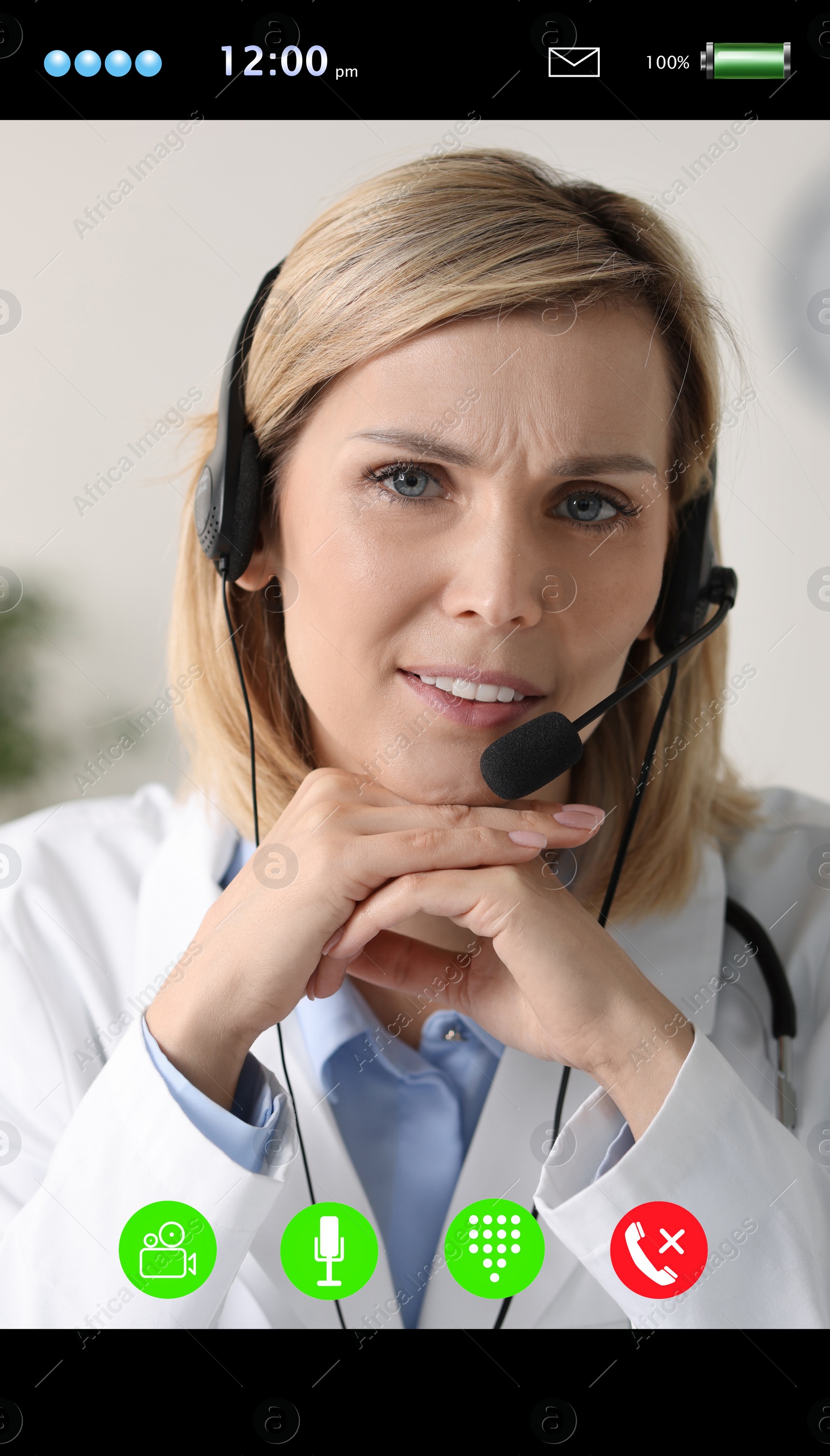 Image of Online medical consultation. Doctor with headset working via video chat application