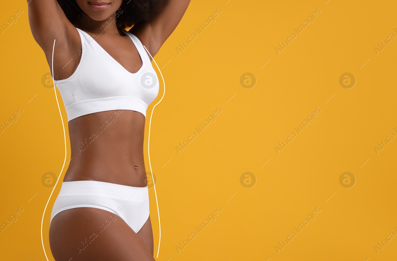 Image of Woman showing her beautiful figure on orange background, closeup. Space for text. Her body outline before cosmetic treatment