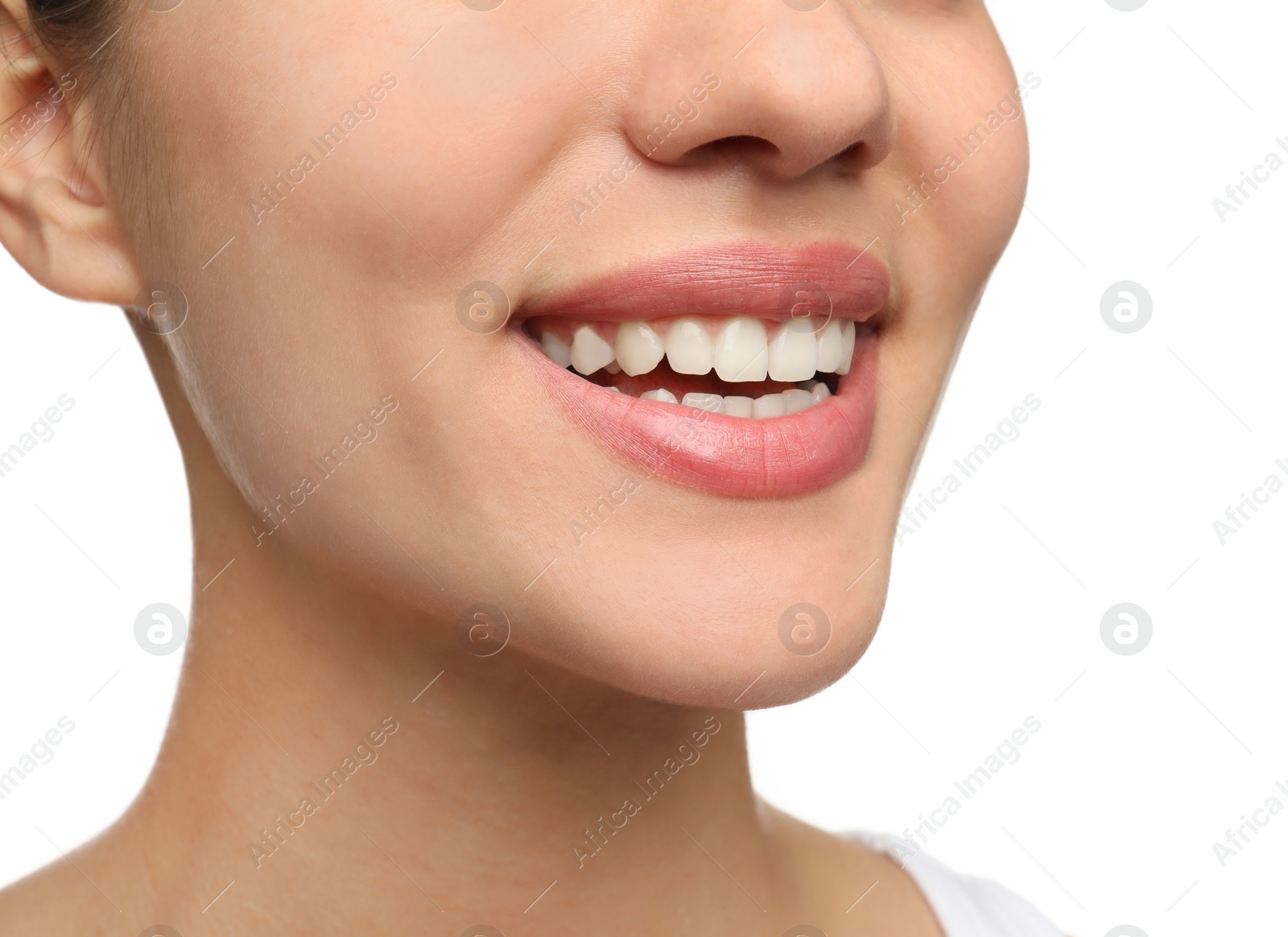 Photo of Woman with healthy teeth and beautiful smile on white background, closeup. Cosmetic dentistry