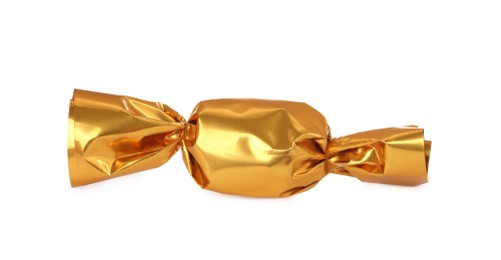 Photo of Delicious candy in golden wrapper isolated on white