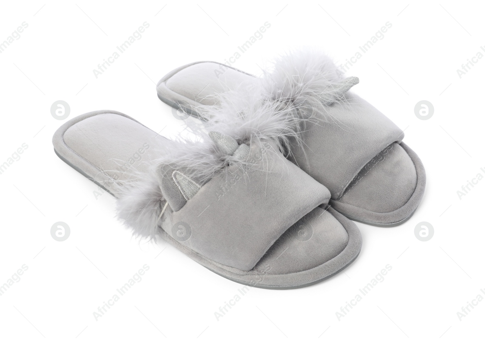 Photo of Pair of soft slippers with fur isolated on white