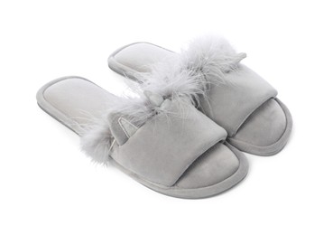 Pair of soft slippers with fur isolated on white