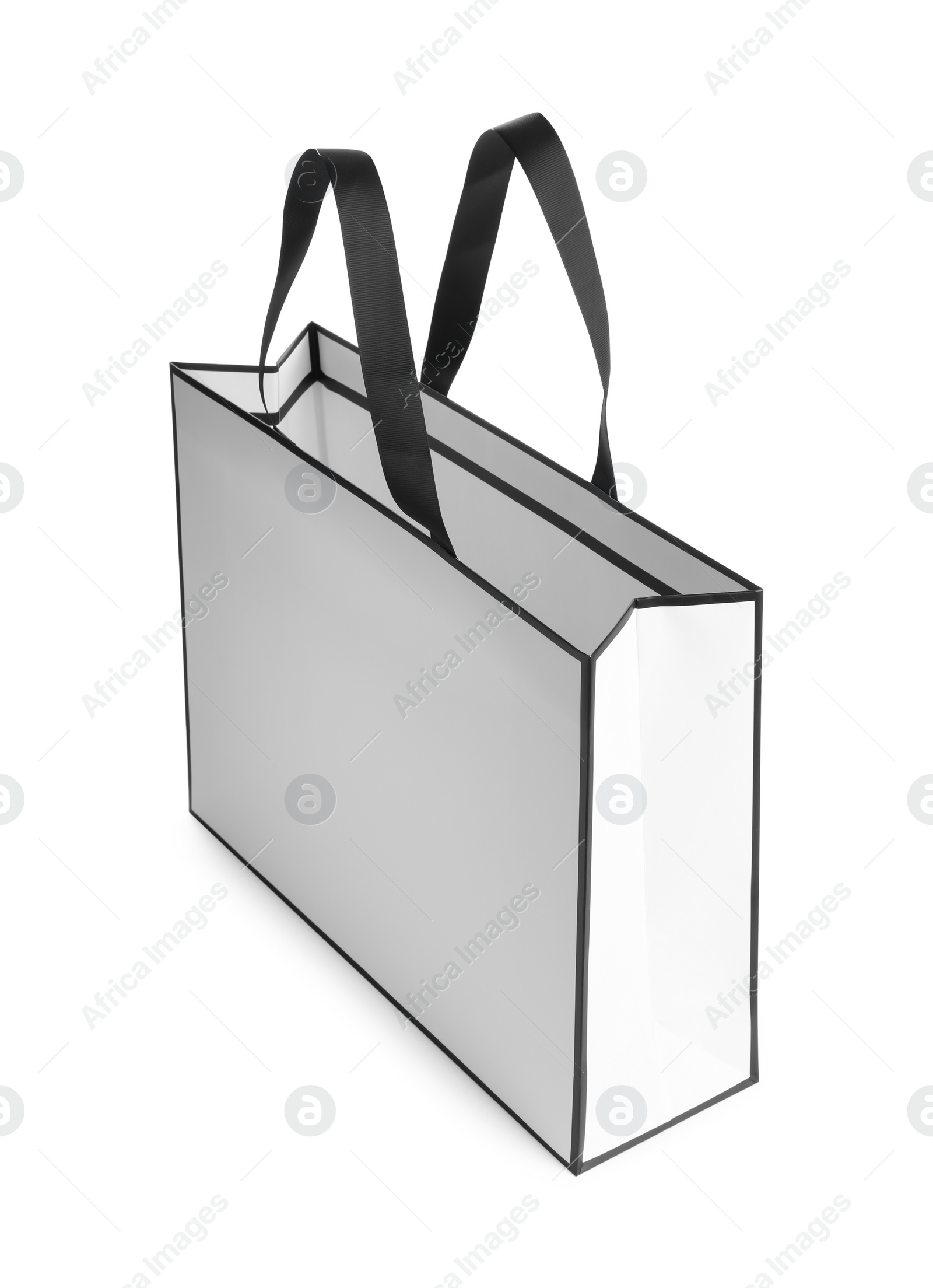 Photo of One paper bag isolated on white. Mockup for design