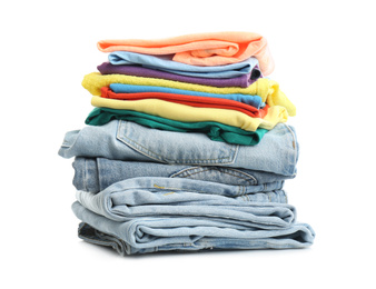 Photo of Stack of folded clothes isolated on white