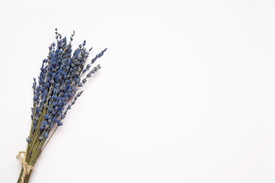 Bunch of beautiful dried flowers on white background, top view