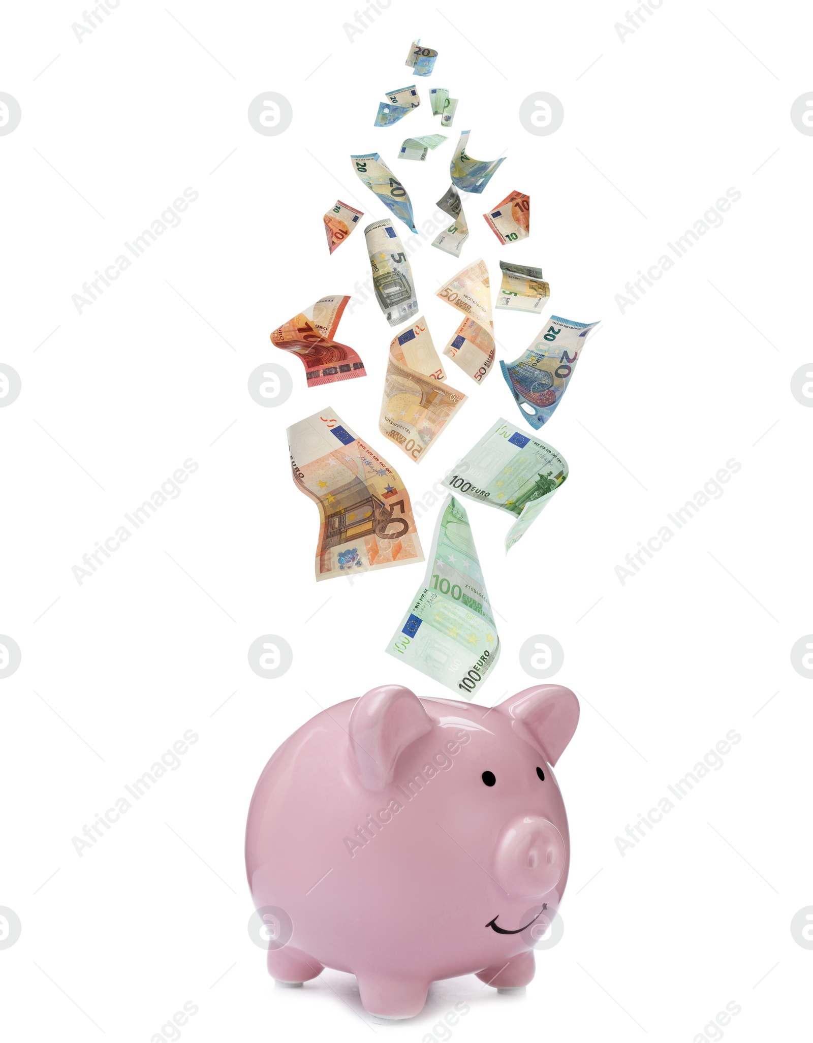 Image of Euro banknotes falling into pink piggy bank on white background