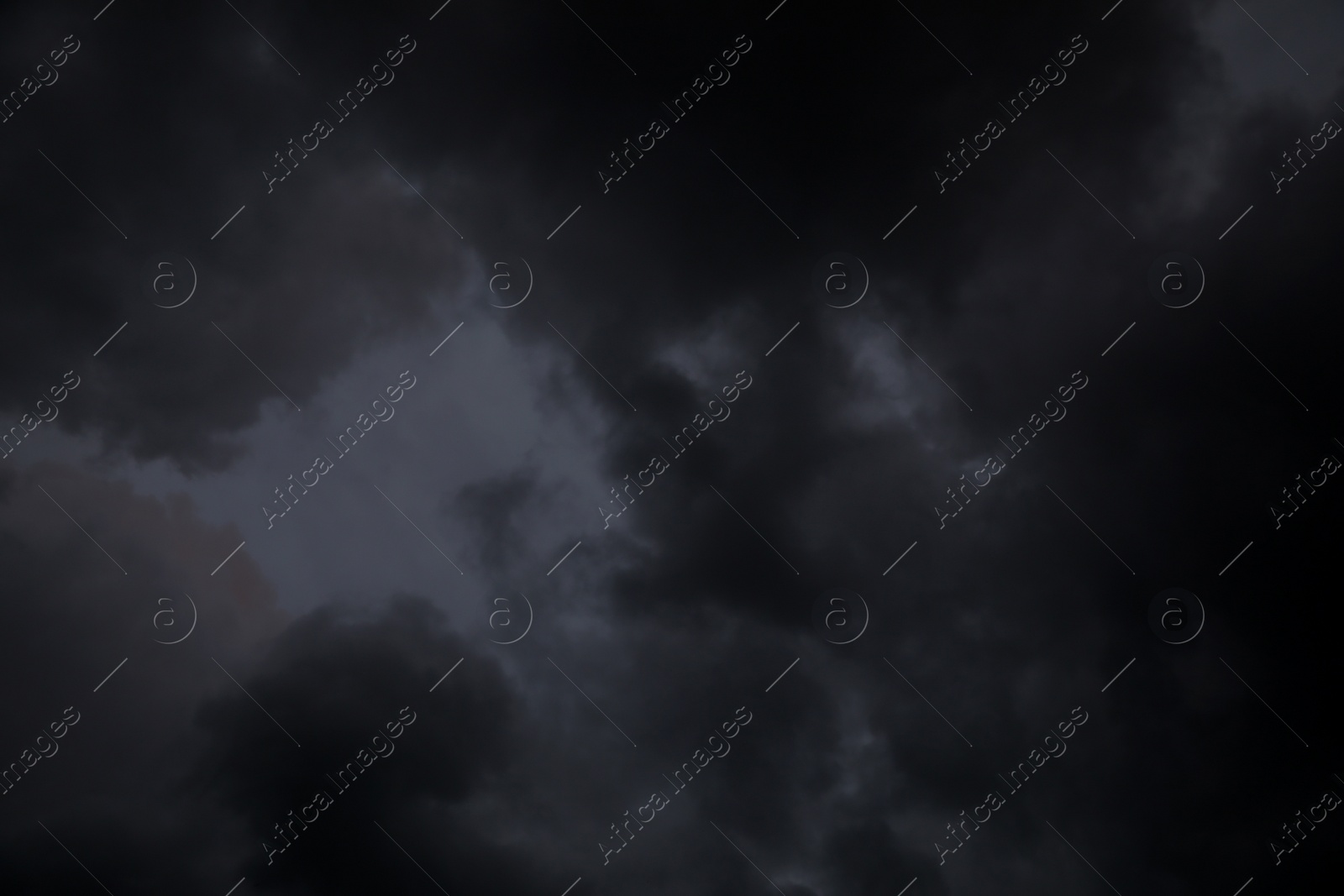 Photo of Picturesque view of sky with heavy rainy clouds. Stormy weather