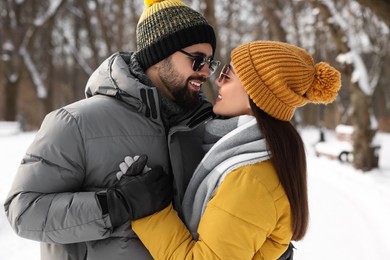 Beautiful happy couple spending time together on winter day