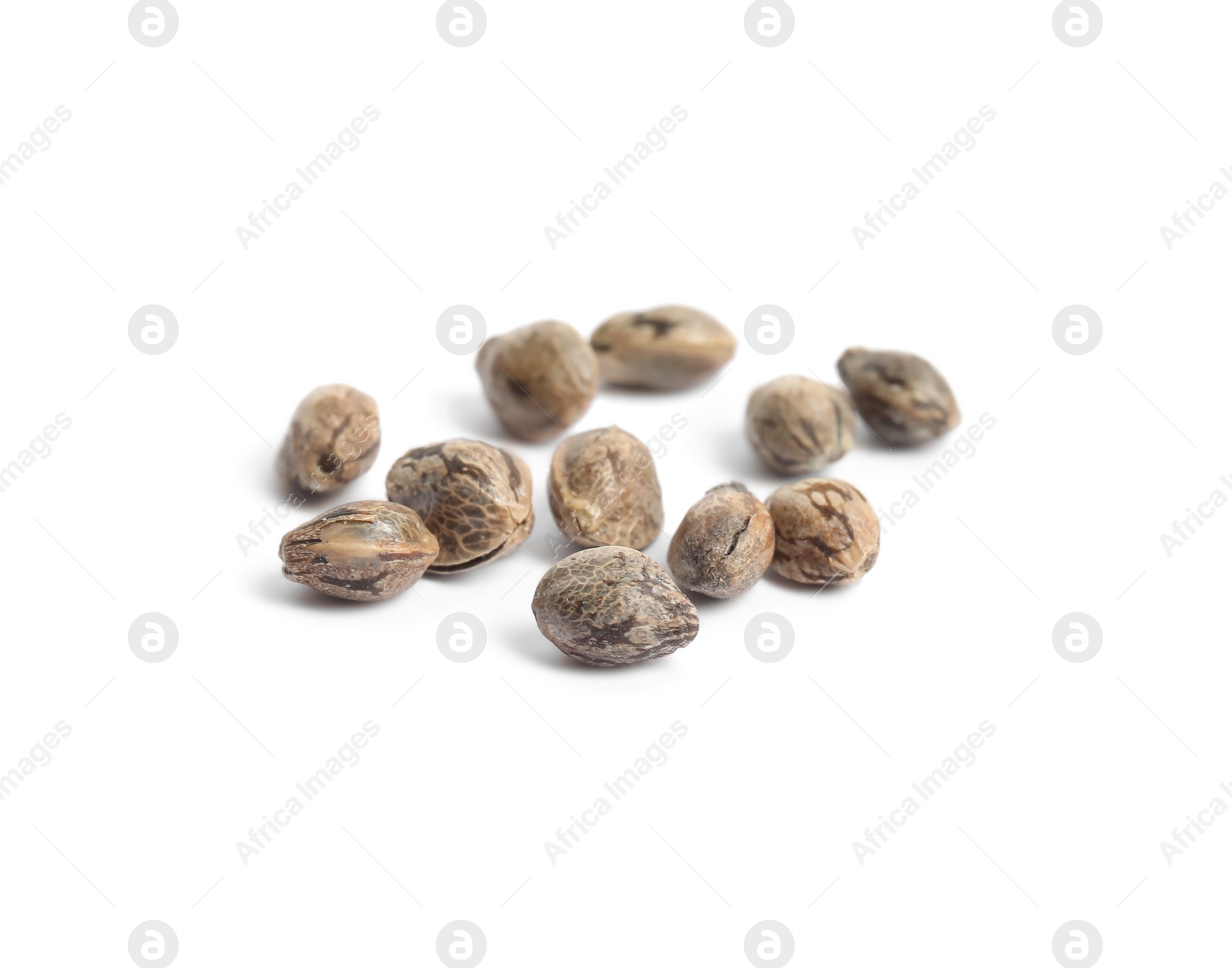 Photo of Raw organic hemp seeds on white background