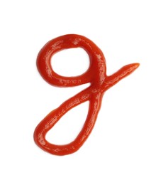 Photo of Letter G written with ketchup on white background