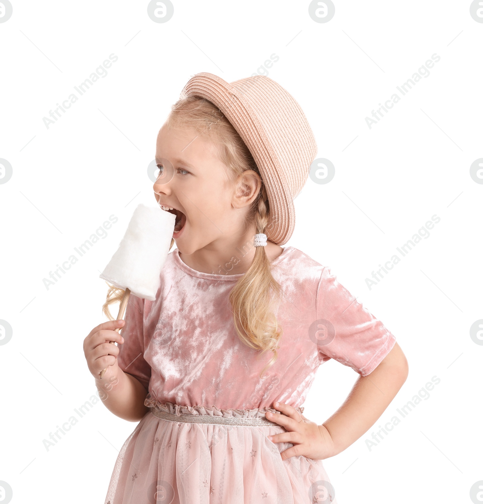 Photo of Cute little girl with cotton candy on white background