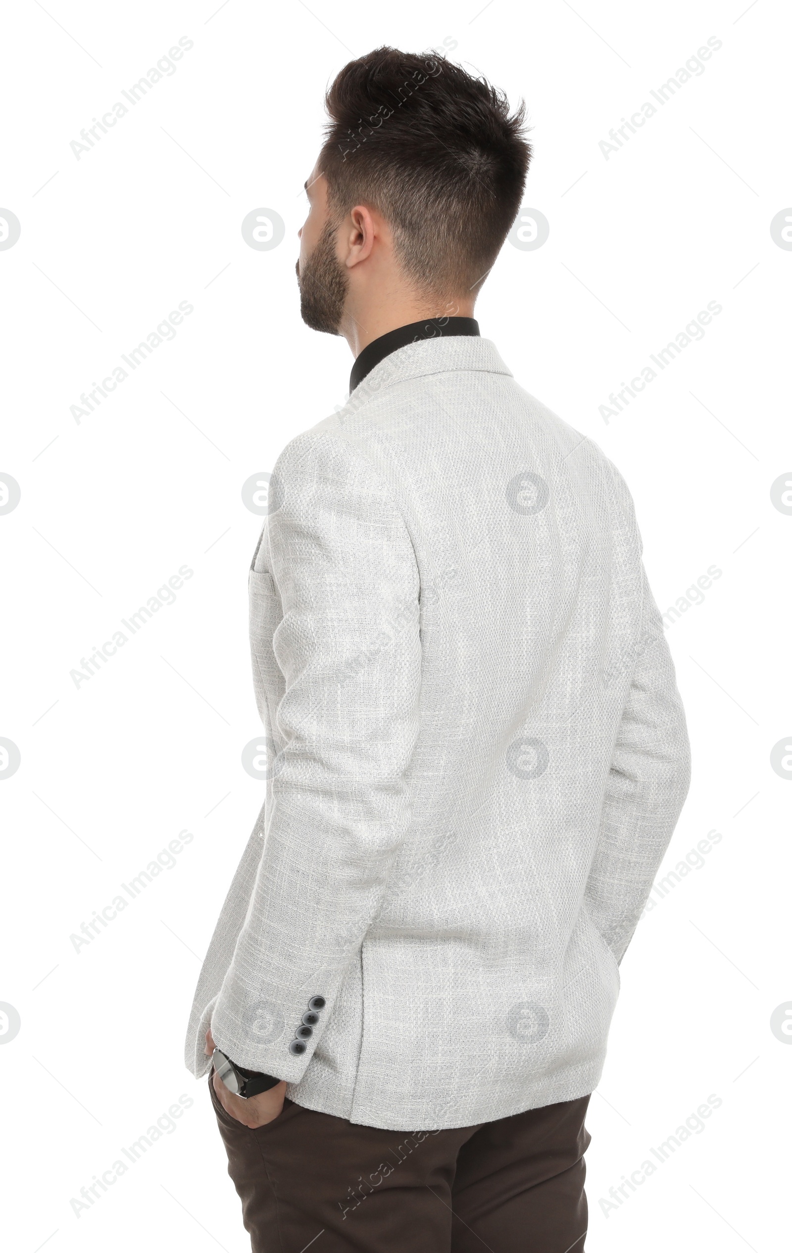 Photo of Young professional businessman in suit on white background