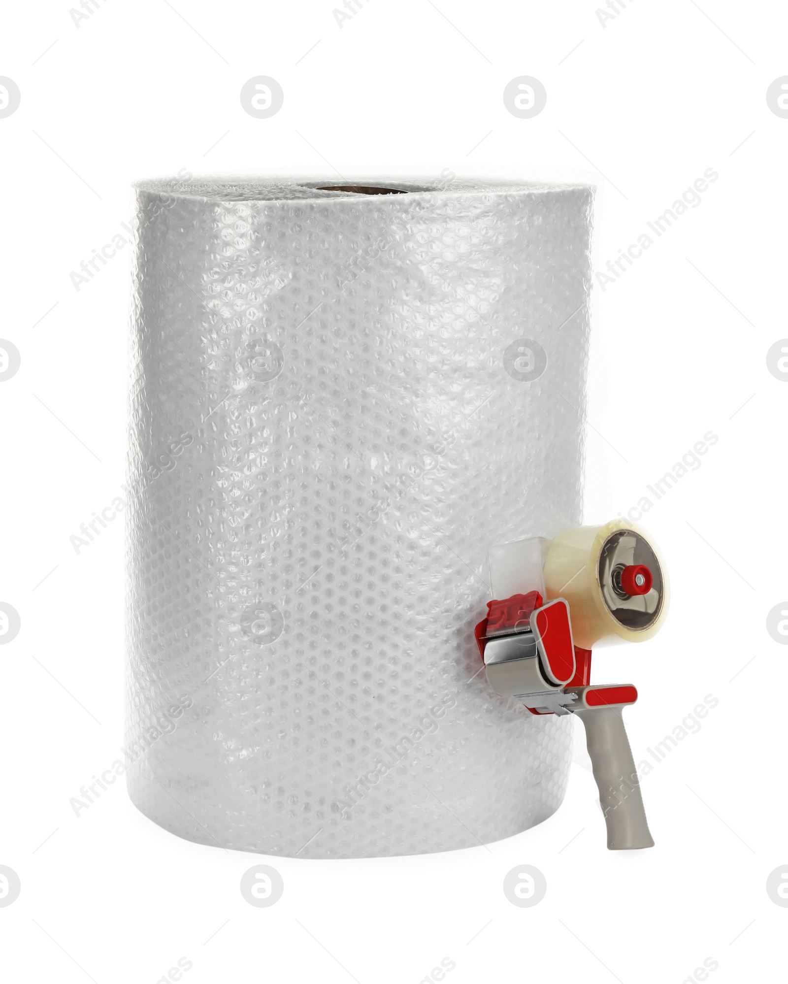 Photo of Bubble wrap roll and tape dispenser isolated on white