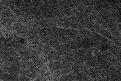 Image of Texture of dark grey stone surface as background, closeup