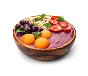 Photo of Bowl with tasty acai smoothie on white background