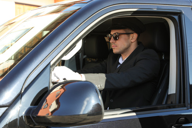 Professional driver in luxury car. Chauffeur service