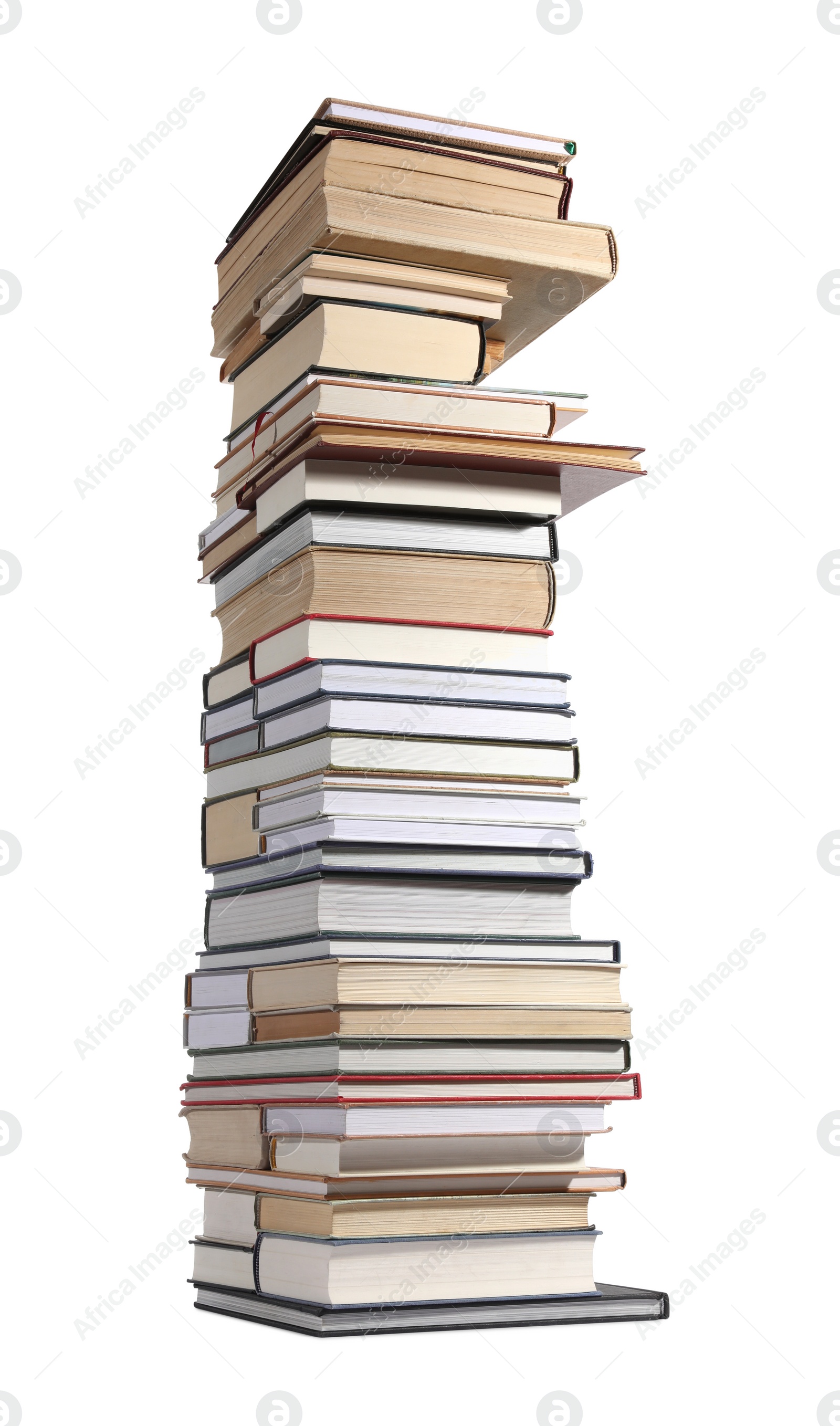 Photo of High stack of many different books isolated on white