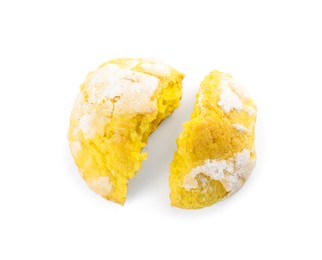 Photo of Broken tasty lemon cookie on white background, top view