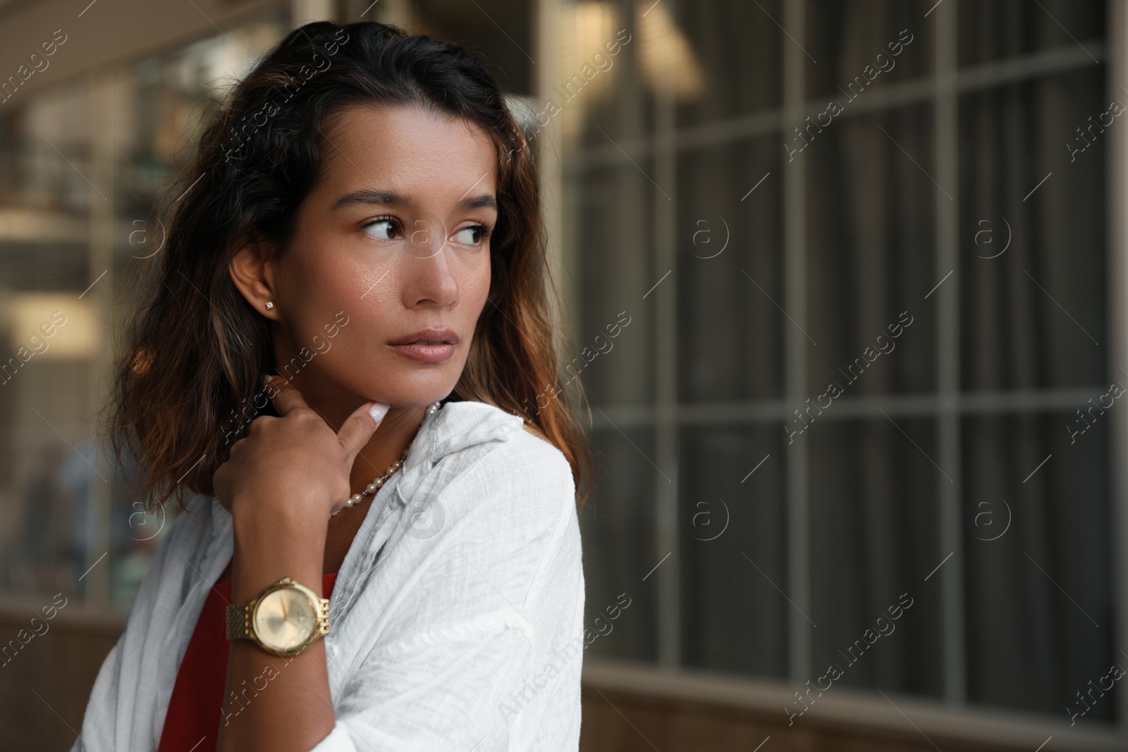 Photo of Portrait of beautiful young woman outdoors. Space for text