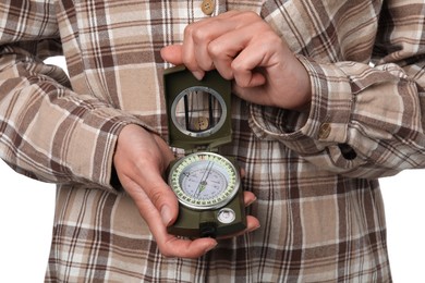 Photo of Woman holding compass on white background, closeup