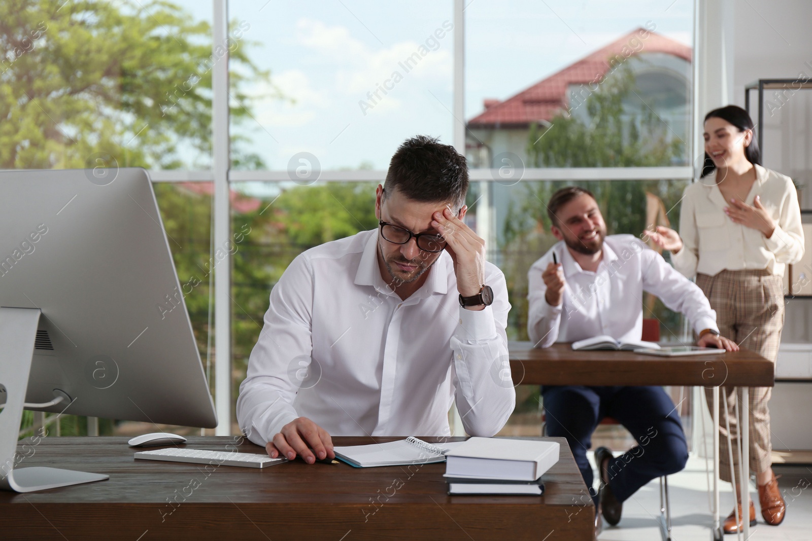 Photo of Man suffering from toxic environment at work