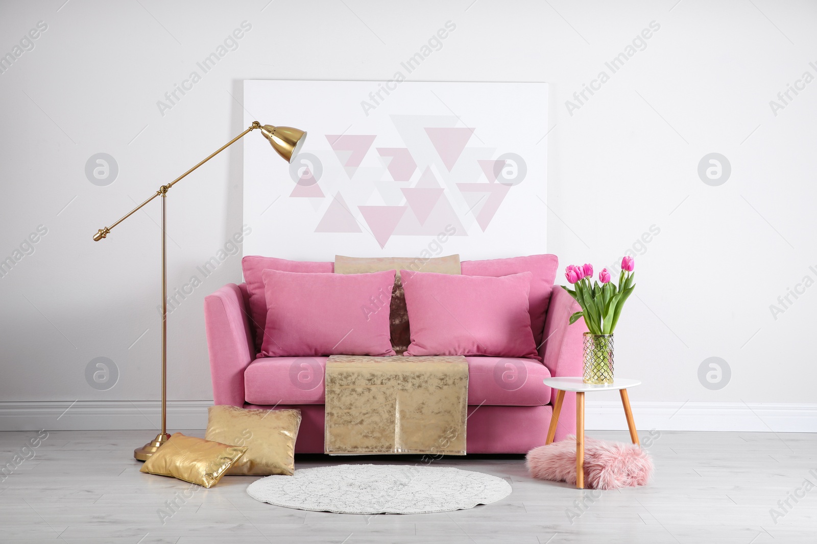 Photo of Modern living room interior with stylish pink sofa