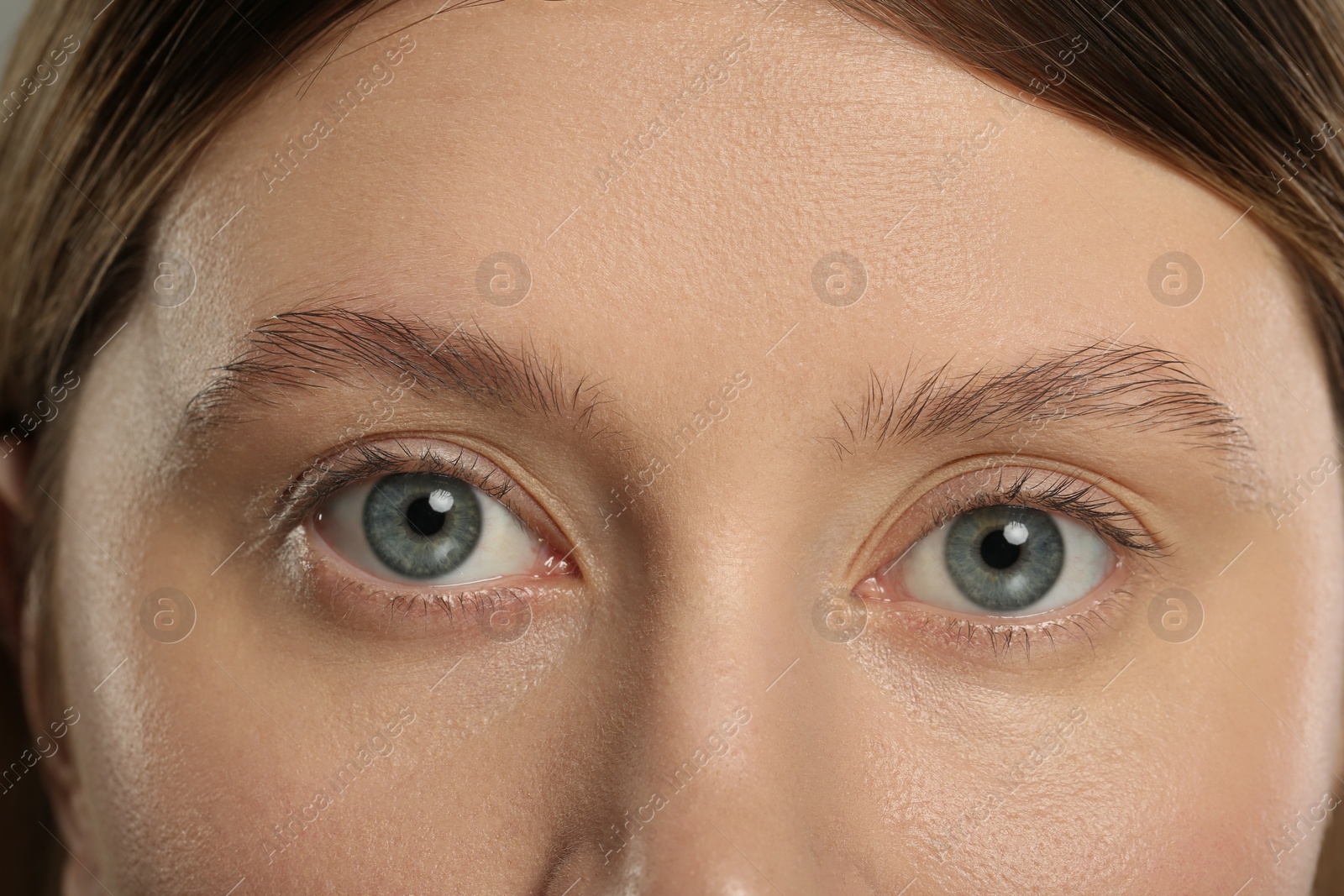 Photo of Woman with beautiful natural eyelashes, closeup view