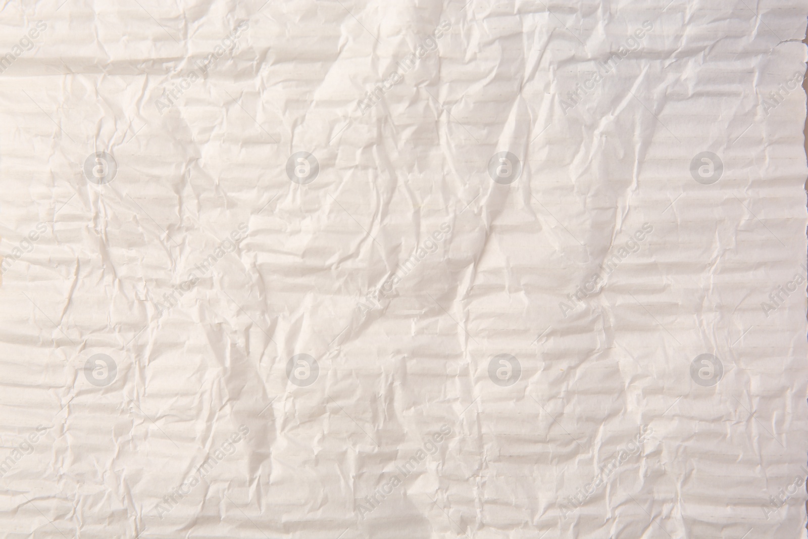 Photo of Sheet of creased paper as background, top view