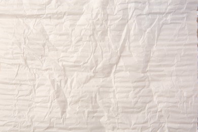 Photo of Sheet of creased paper as background, top view