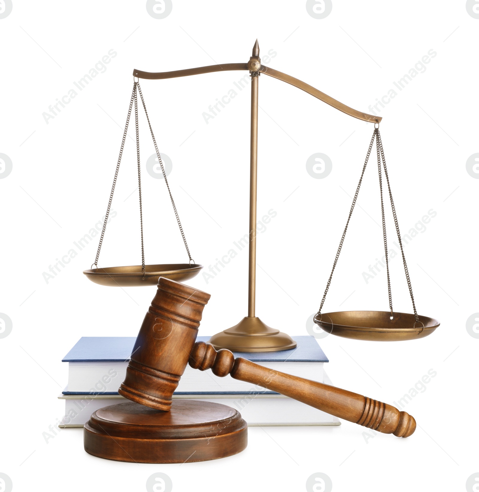 Photo of Wooden gavel, books and scales of justice on white background