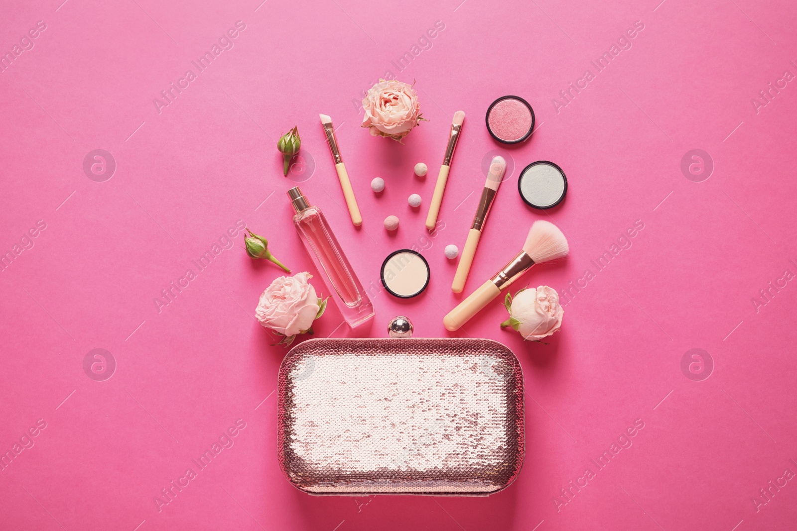 Photo of Flat lay composition with products for decorative makeup on pink background