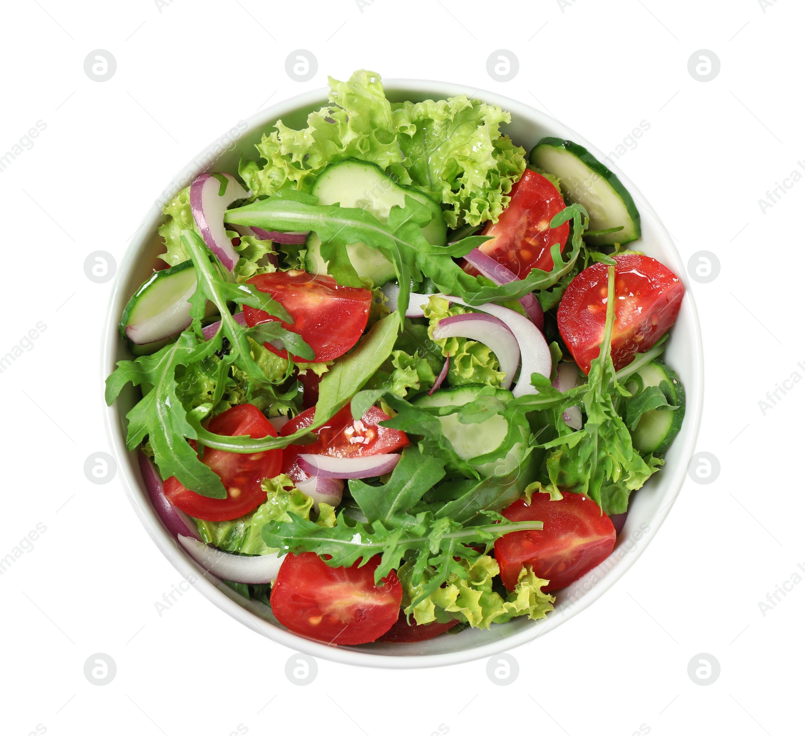 Photo of Delicious salad with arugula and vegetables isolated on white, top view