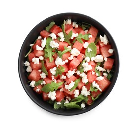 Photo of Delicious salad with watermelon, arugula and feta cheese isolated on white, top view