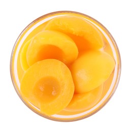 Halves of canned peaches in bowl isolated on white, top view